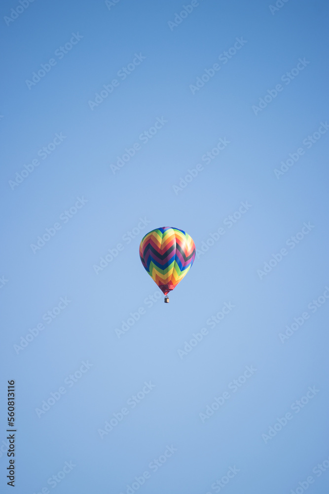 Colorful hot air balloon isolated with clear sky and copy space Colorful hot air balloon isolated with clear sky and copy space