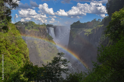 The iconic Victoria Falls,  Mosi-Oa-Tunya waterfall, view from the Zimbabwe side, with a rainbow. photo