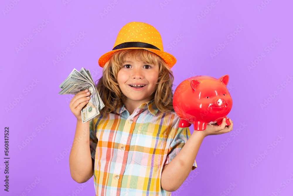 Cash money dollars bills and piggy bank concept. Boy saving money in a piggybank. Child boy with american dollars money. Cash money dollars bills and piggy bank concept. Boy saving money in a piggybank. Child boy with american dollars money.