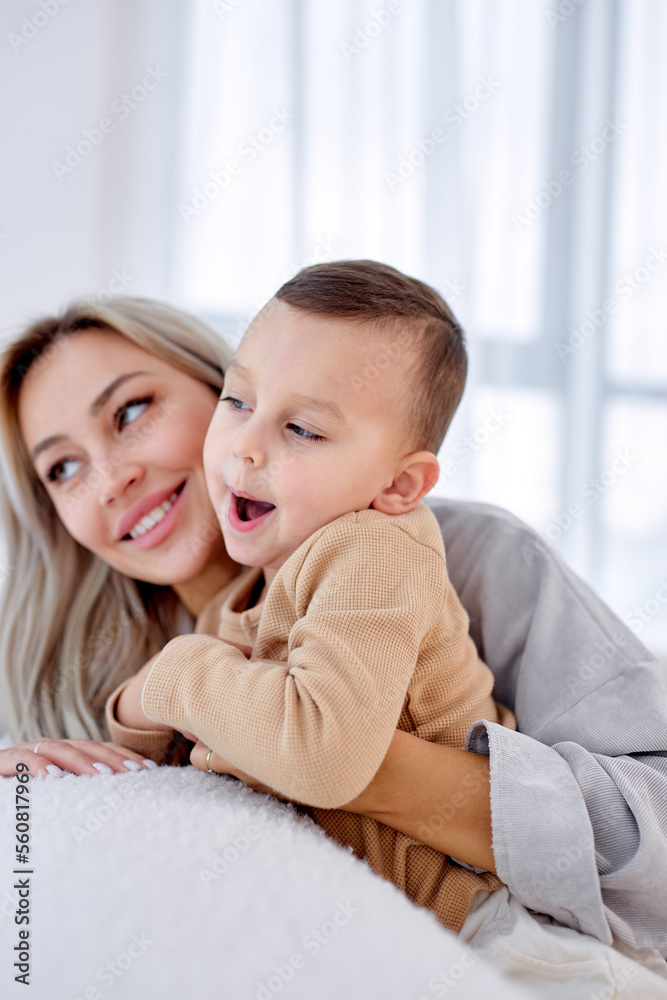 beautiful faces happy family portrait loving caucasian son have fun with mother, mom enjoy moment of tenderness, feels deep love to her pretty kid, children, offspring and lifestyle concept beautiful faces happy family portrait loving caucasian son have fun with mother, mom enjoy moment of tenderness, feels deep love to her pretty kid, children, offspring and lifestyle concept