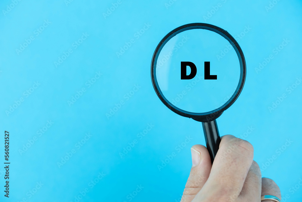 Focused on DL exam. Word DL (Diplôme de Langue Française) under ...