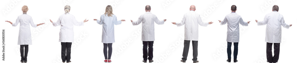 group of doctors standing with their backs isolated group of doctors standing with their backs isolated