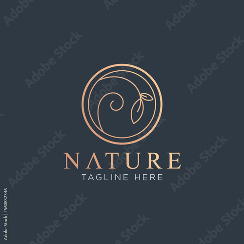 Nature logo abstract with elegant floral ornament in a circle 