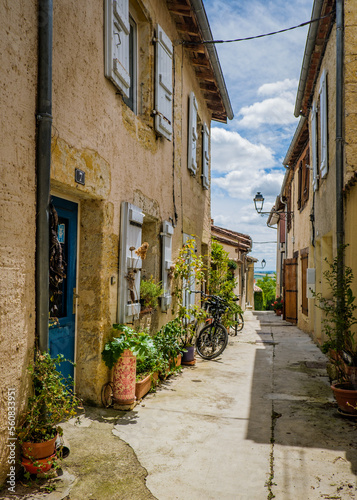 Fototapeta Naklejka Na Ścianę i Meble -  Cute, flowery and narrow streets of the small village of Lectoure in the south of France (Gers)
