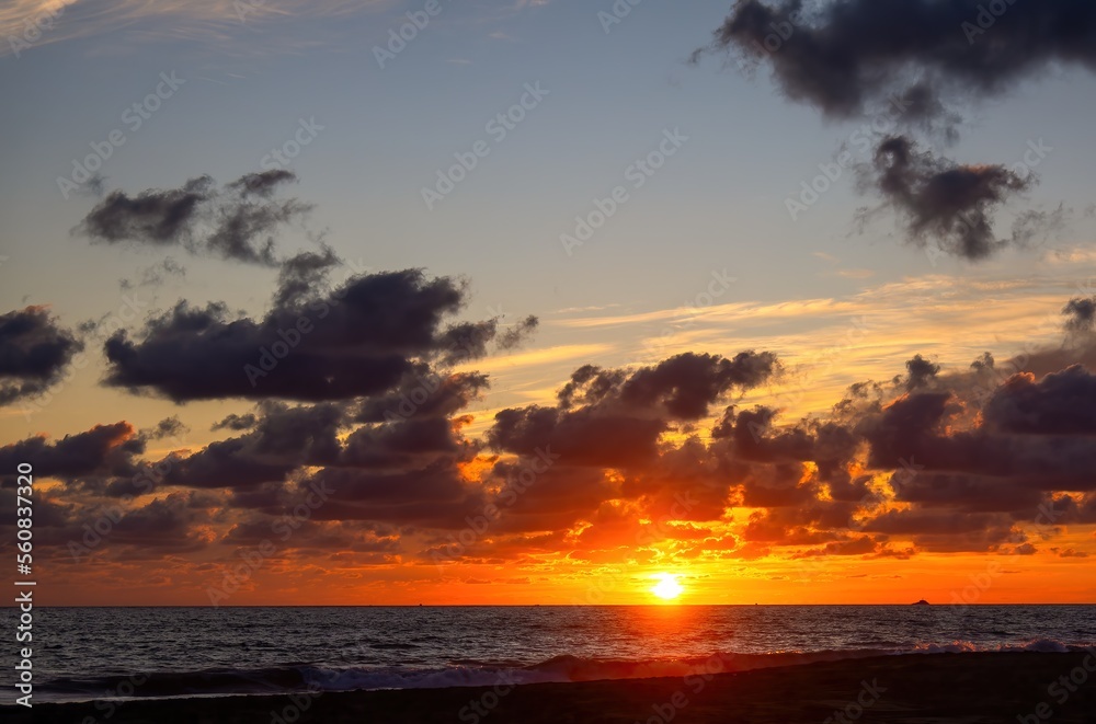 Sunset on the beach with beautiful clouds Sunset on the beach with beautiful clouds