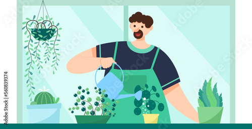 gardener in the herbarium watering plants, gardening plants