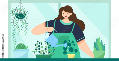 gardener in the herbarium watering plants, gardening plants