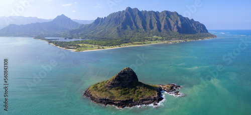 Panoramic aerial view of the Koolau Mountain Range on the east side of Oahu with Chinaman's Hat (Mokolii Island) in the foreground