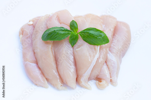 Raw chicken tenders on white background.