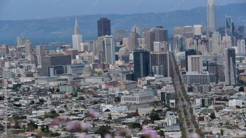 Lockdown Shot Of Vehicles Moving On Road Amidst Buildings And Houses In City - San Francisco, California Lockdown Shot Of Vehicles Moving On Road Amidst Buildings And Houses In City - San Francisco, California
