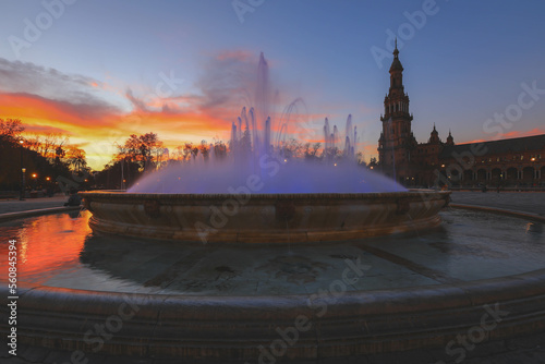 Selective focus on Vicente Traver fountain, Plaza de Espana or Spain square with Vicente Traver fountain at night, Seville, Spain