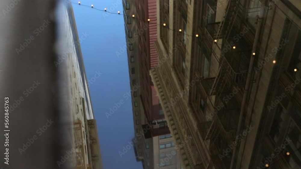 Reflection Of Buildings On Water Puddle At City Street - San Francisco, California Reflection Of Buildings On Water Puddle At City Street - San Francisco, California