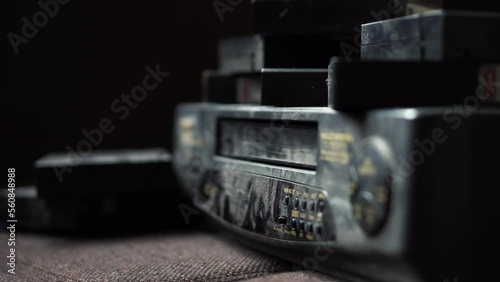 Removing a VHS tape from a VCR