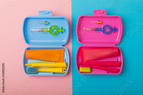 Oral care.Travel set with a toothbrush, toothbrush and toothpaste in a case.Composition on a textural bright background. Dentist concept. Flat lay. copy space.Place for text