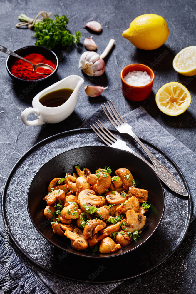 Spanish Garlic Mushrooms in bowl, top view Spanish Garlic Mushrooms in bowl, top view