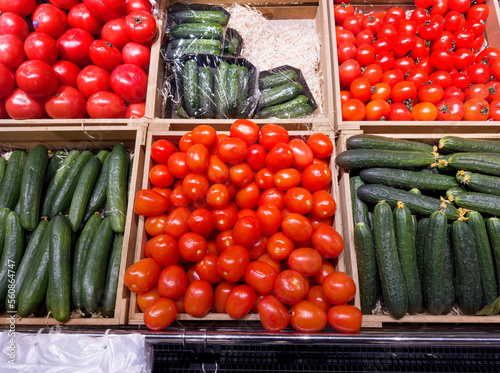 buying vegetables cucumbers  tomatoes  onions  peppers  eggplant  zucchini  at the market