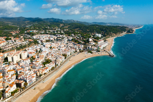 Townscape of Sant Pol de Mar, Maresme region, Catalonia, Spain. View of sea coast and beach.