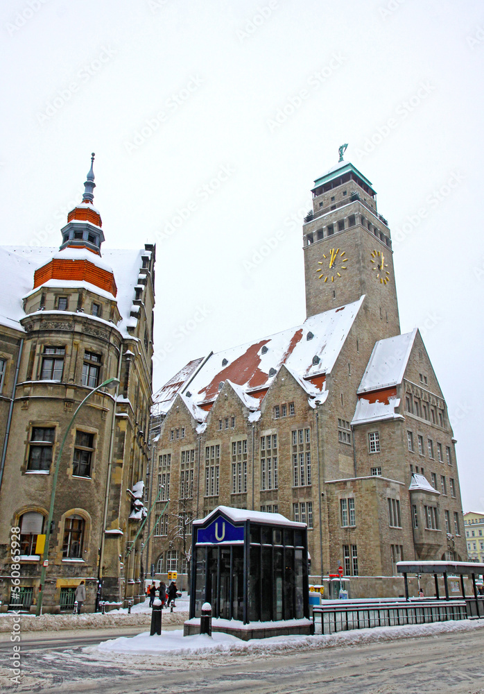 Town Hall (Rathaus) building of Neukolln inner-city locality in Berlin, Germany. Entrance to the U-Bahn Rathaus Neukolln station on a foreground