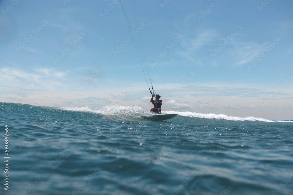 Kite surfer on the sea Kite surfer on the sea