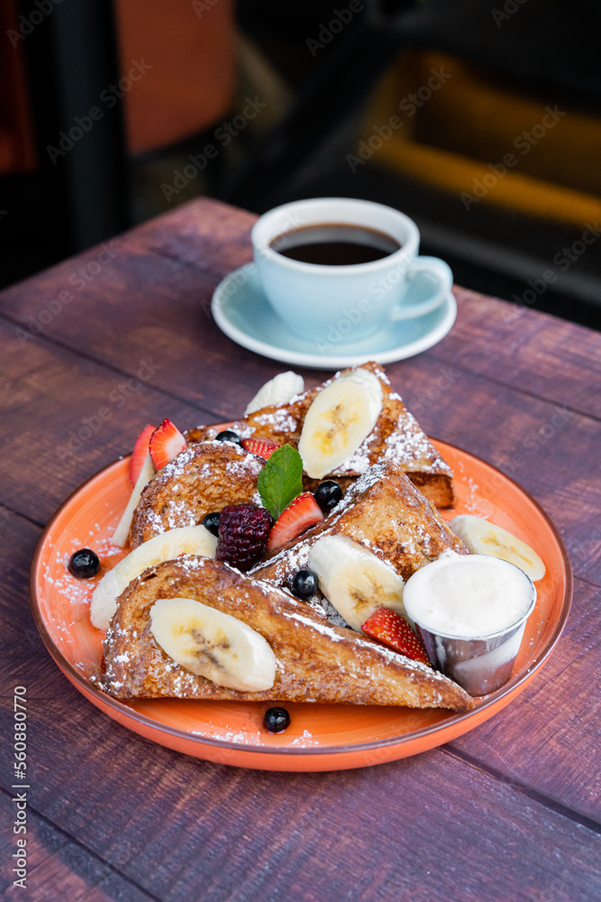 Delicious and spongy french toast with red berries Delicious and spongy french toast with red berries