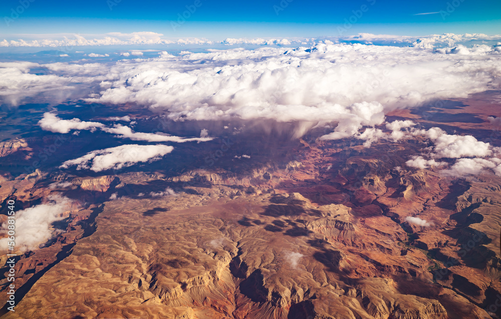 By flying to Los Angeles, you can see the sky over the Nevada deserts. The deserts lead to places like Hoover Dam, Valley of Fire, Lake Mead, Red Rock Canyon, Zion National Park, and the Grand Canyon.