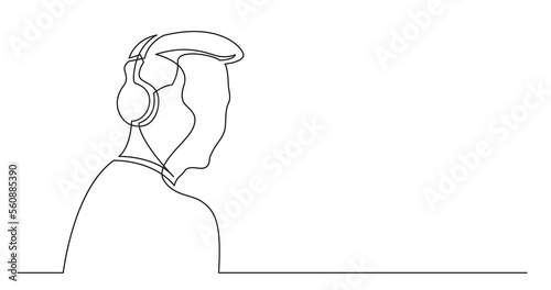 continuous line drawing of young stylish man listening music in headphones - PNG image with transparent background photo