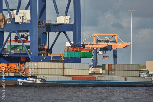 Loading containers on a ship photo