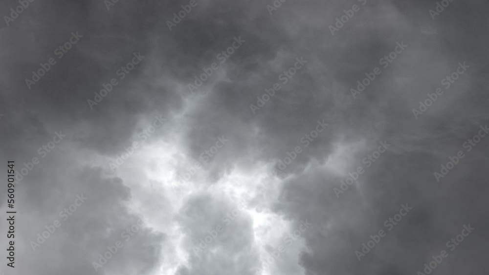 lightning strikes and dark clouds rumble in the sky. lightning strikes and dark clouds rumble in the sky.