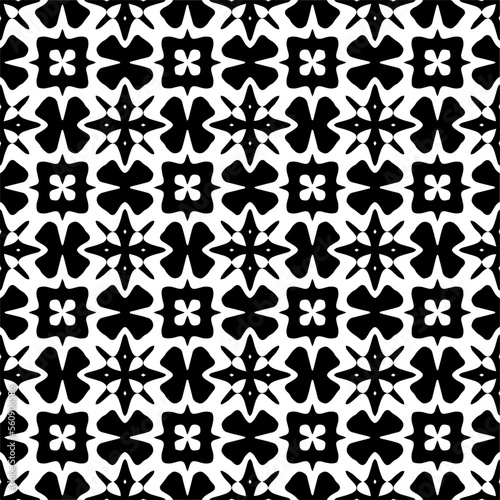 Seamless pattern of black shapes on white background.