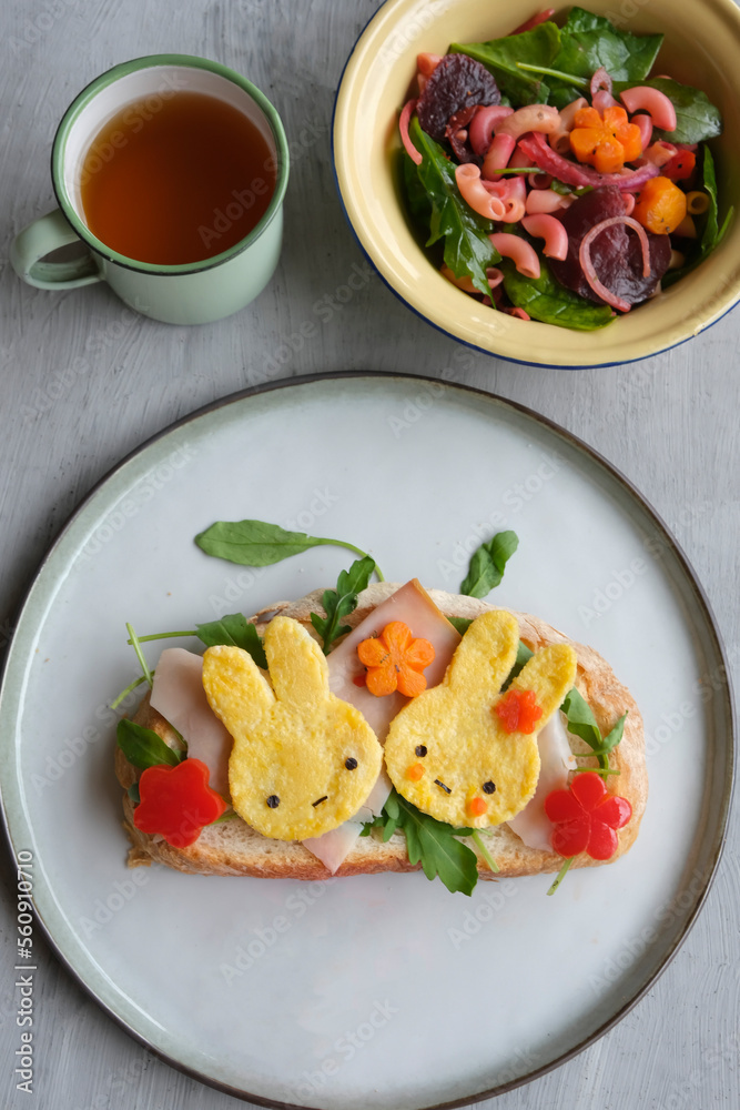 Healthy living during the holiday seasons. Healthy Breakfast of Ham Sourdough Bread with Fresh Salad and English oor Chinese Tea