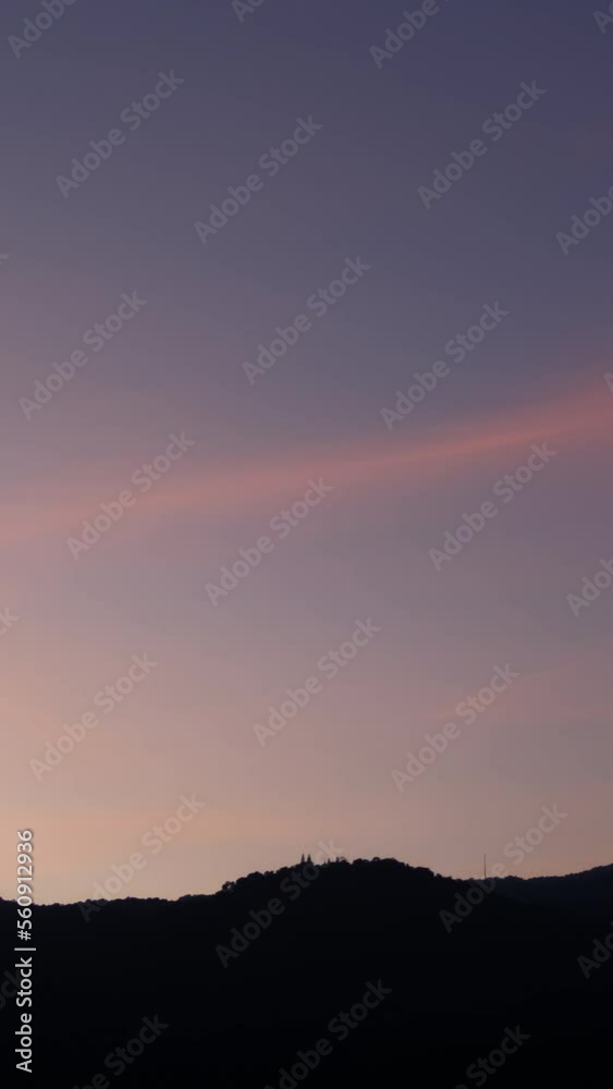 Twilight and dawn sky with cumulus cloud vertical time lapse in an evening. Twilight and dawn sky with cumulus cloud vertical time lapse in an evening.