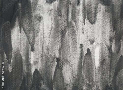 Watercolor stroke and spray on paper , Abstract background by hand drawn gray and black color liquid drip