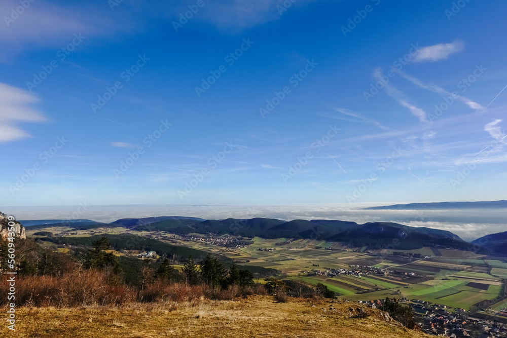 view to dense fog at the horizon with blue sky and sunshine