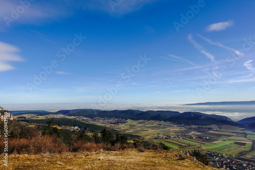 view to dense fog at the horizon with blue sky and sunshine