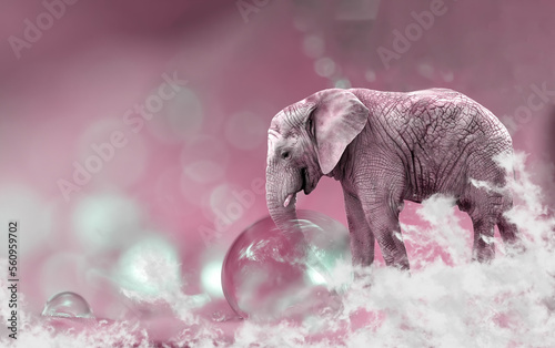 a pink elephant dipping its trunk in a bubble