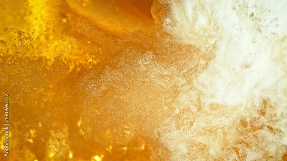 Super Slow Motion Shot of Fresh Beer Background at 1000fps. Super Slow Motion Shot of Fresh Beer Background at 1000fps.