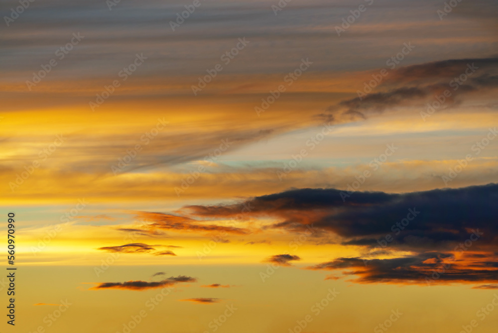Painted clouds with pastel colors during sunset.