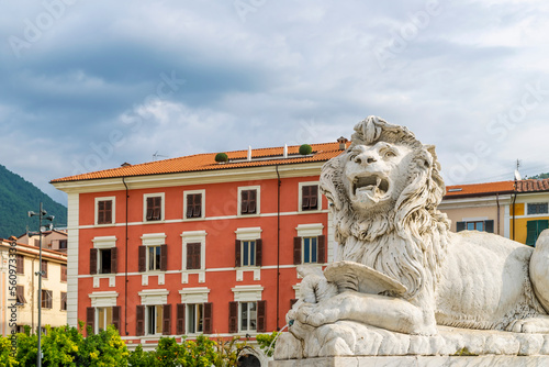 One of the marble lions in Piazza Aranci, historic center of Massa, Italy
