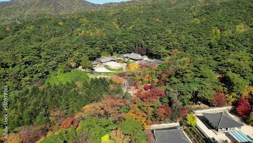 Gyeongju: Aerial view of city in South Korea, Bulguksa Buddhist temple complex on the slopes of Mount Toham, trees in autumn colors - landscape panorama of East Asia from above photo