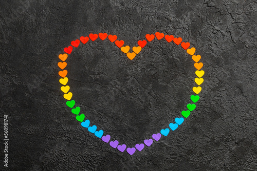 Rainbow heart on a black background. Hearts in the colors of the LGBT flag