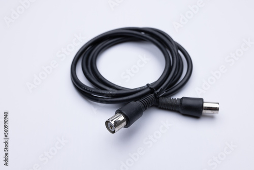 Black coax cable on white background photo