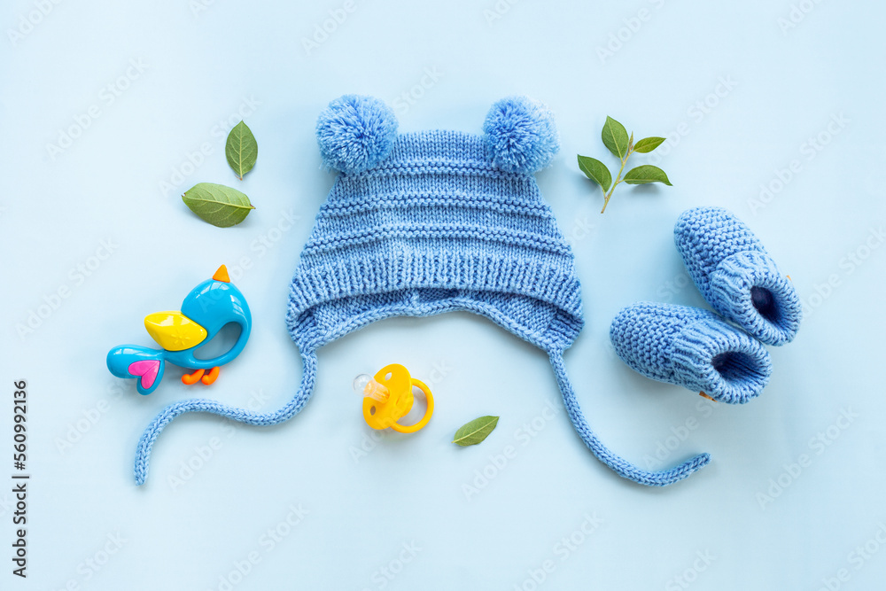 Baby boy blue hat with booties and accessories, top view Stock Photo