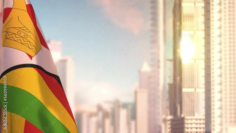 Zimbabwe flag at sunrise with modern city architecture