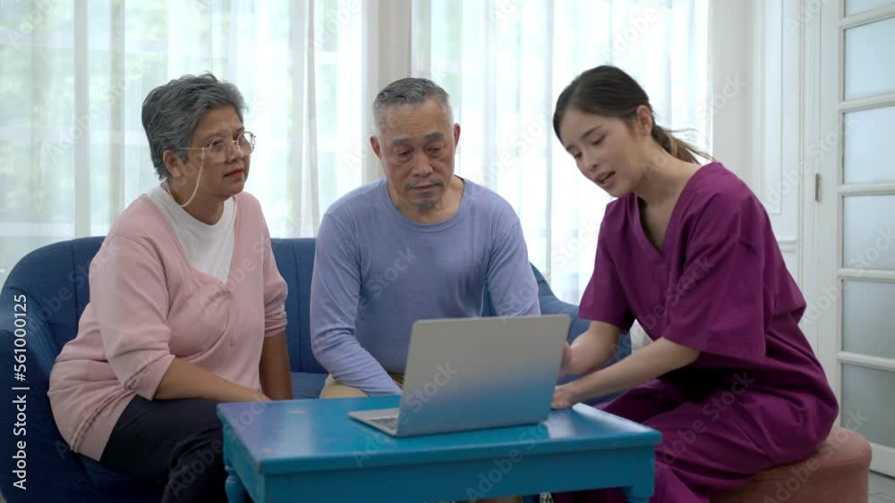 Asian young nurse explain the health check-up result to senior couple on laptop Asian young nurse explain the health check-up result to senior couple on laptop