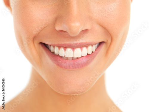 Dental  wellness and woman teeth in studio with a healthy  beautiful and clean cosmetic smile. Happy  closeup and veneers of a female model from Canada with oral hygiene isolated by white background.
