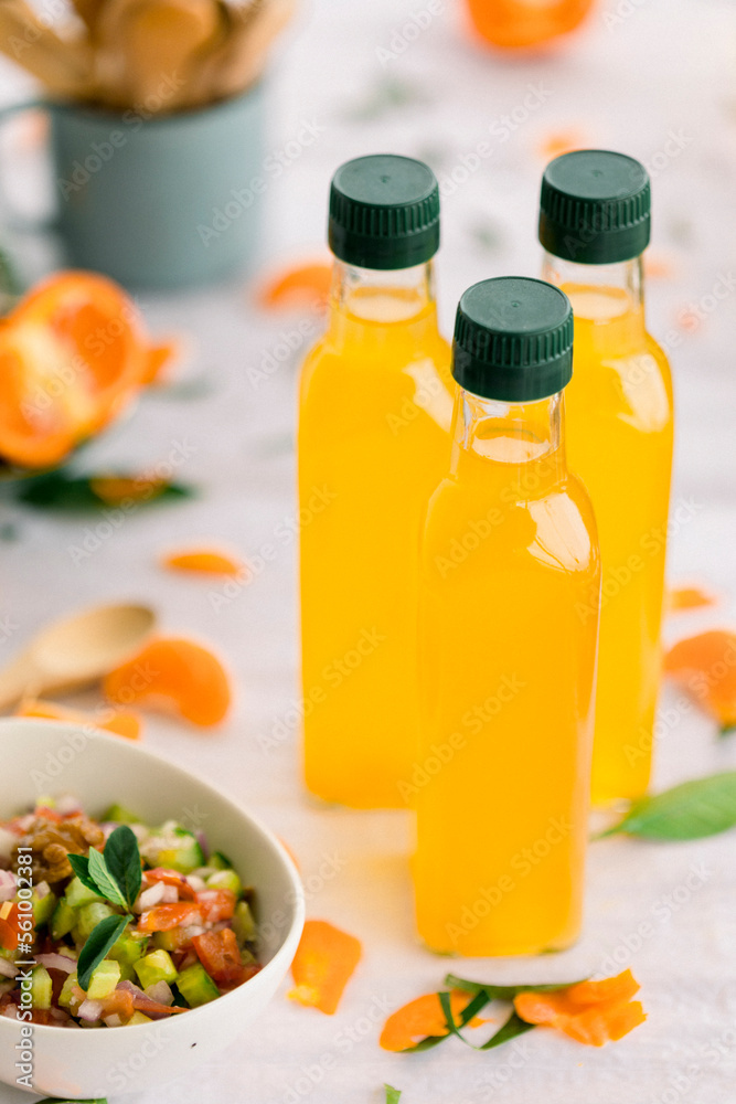 various salad vinegars in glass bottles. Front and top view. apple, lemon, strawberry, quince, grape, melon, apricot, tangerine, orange, grapefruit, various salad vinegars in glass bottles. Front and top view. apple, lemon, strawberry, quince, grape, melon, apricot, tangerine, orange, grapefruit,