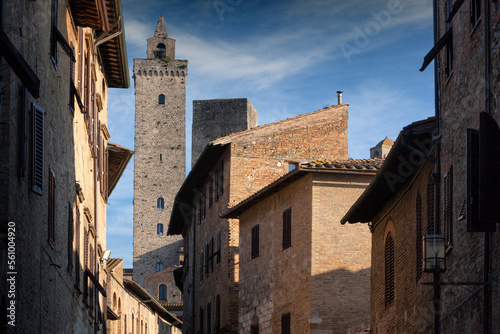 San Gimignano, Siena.
Vista della Torre grossa da una strada nel centro  photo