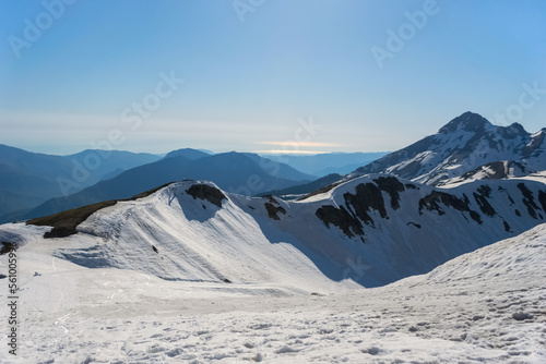 Snowy peaks high in the mountains at arm's length. Krasnodar region, Russia