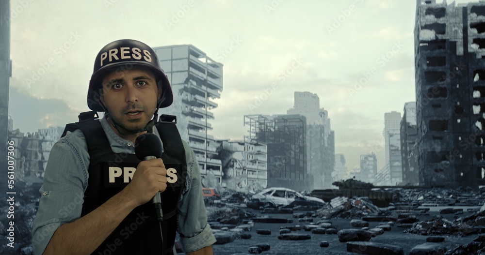 A War Correspondent Male Report from the Ruined Kharkov on the Background of a Shooting Tank. A War Correspondent Male Report from the Ruined Kharkov on the Background of a Shooting Tank.