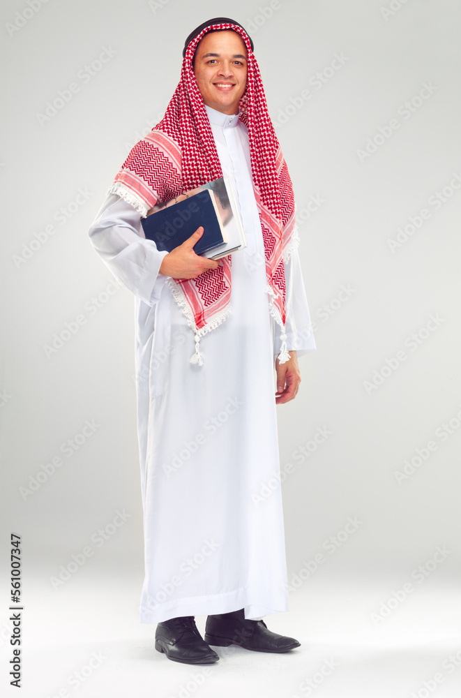 Portrait, Islamic man and books for education, knowledge and guy isolated on white studio background. Muslim, male and student with journals, smile and confident for studying, learning and university